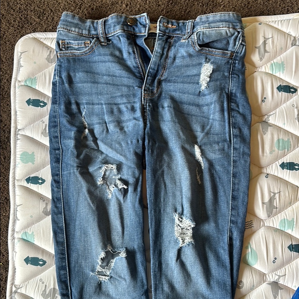 Distressed Blue Jeans